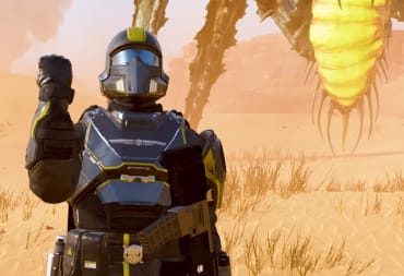 A Helldiver saluting while a Bile Titan stands behind them in Helldivers 2